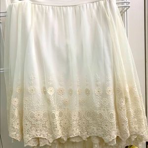 White and beige lace skirt
